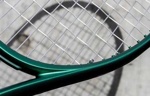 round poly string Sync in green tennis racket