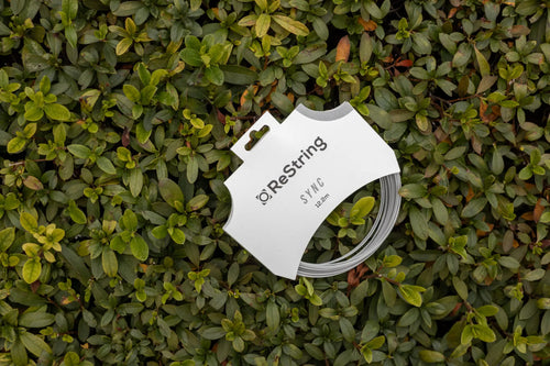 restring sync tennis string vs luxilon alu power on a bed of leaves