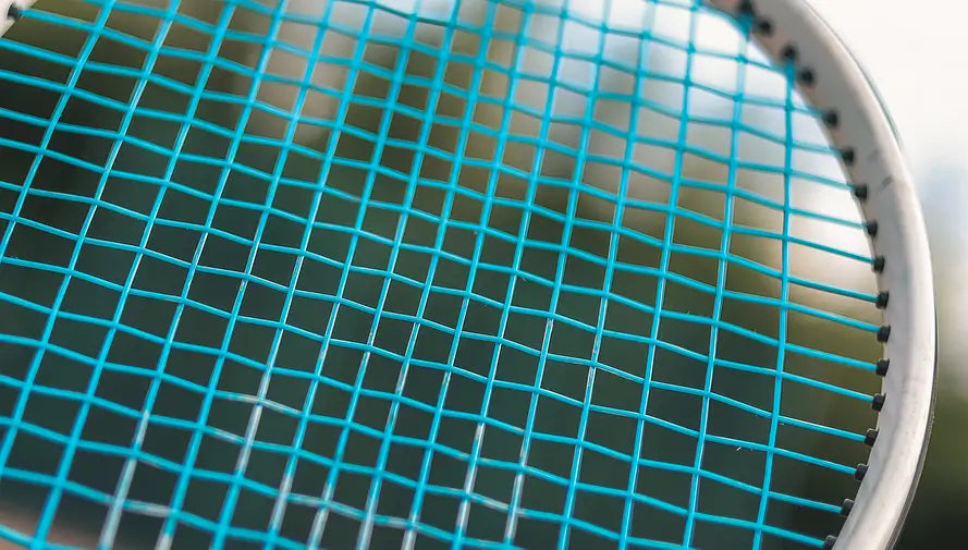 tennis racket with blue zero string in it